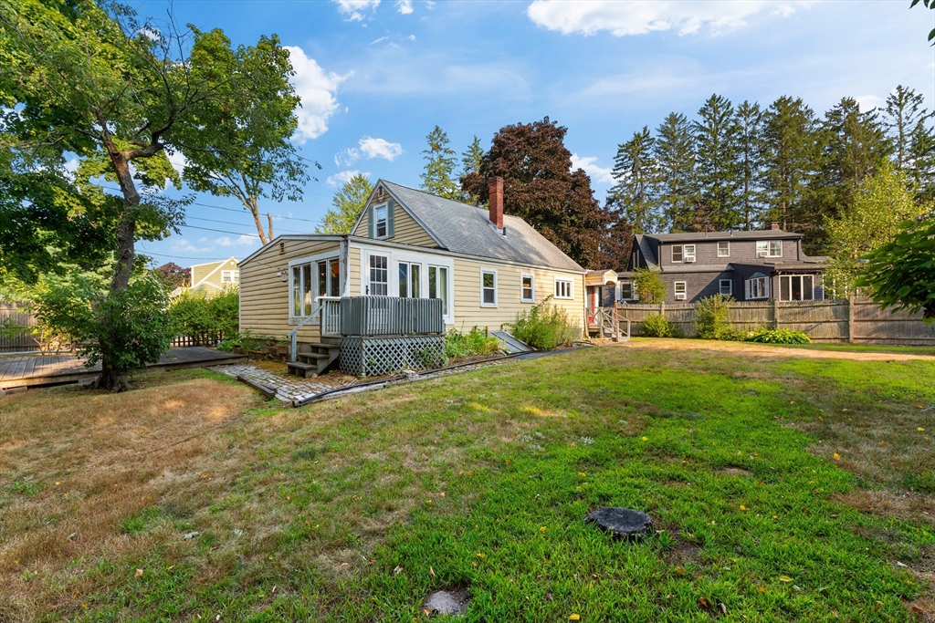 4 Arrowhead Trail Ipswich, MA 01938 - Photo 5 of 39 a view of a house with a yard patio and sitting area