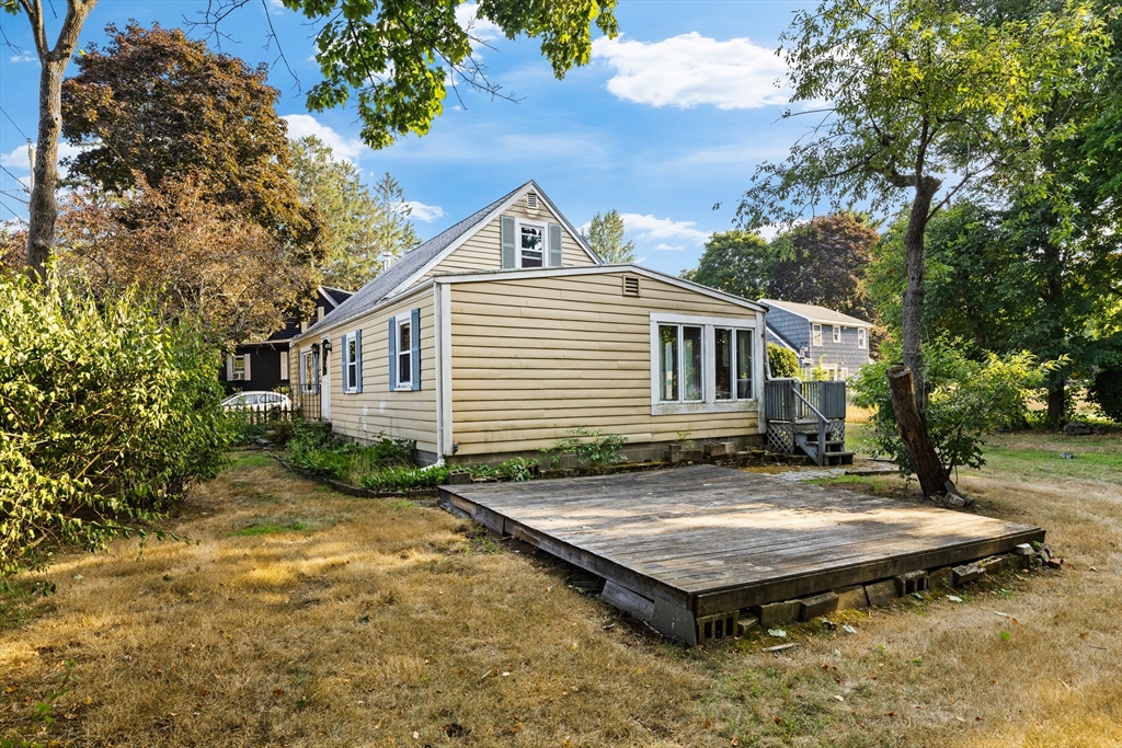 4 Arrowhead Trail Ipswich, MA 01938 - Photo 8 of 39 a view of a house with backyard and sitting area