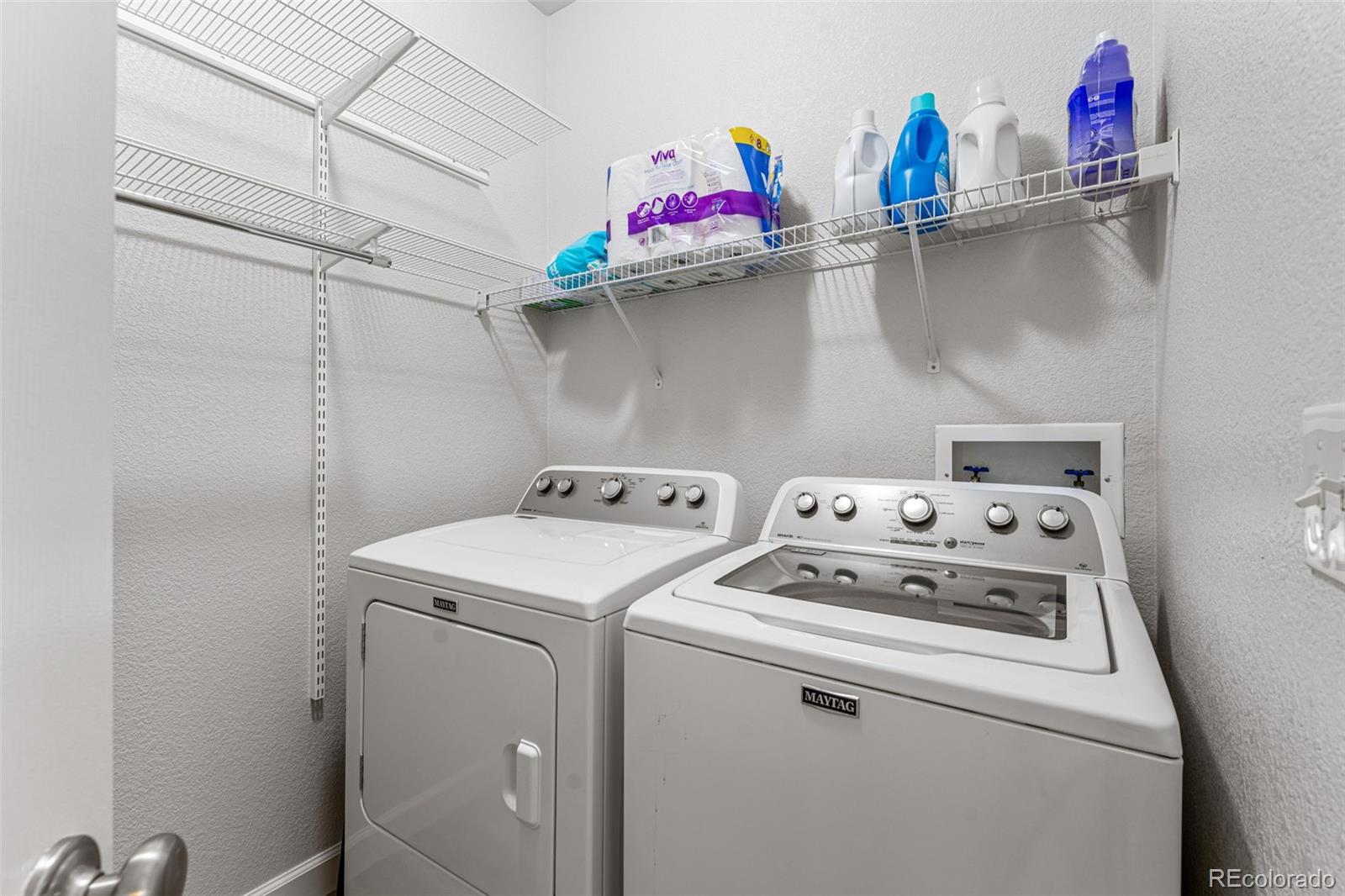 41 Quince Street Denver, CO 80230 - Photo 17 of 47 a utility room with dryer and washer