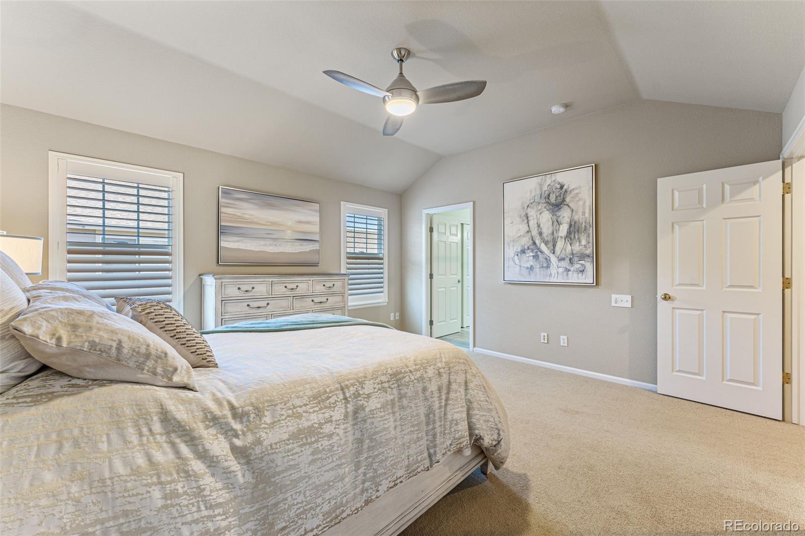 41 Quince Street Denver, CO 80230 - Photo 23 of 47 a bedroom with a large bed and a window