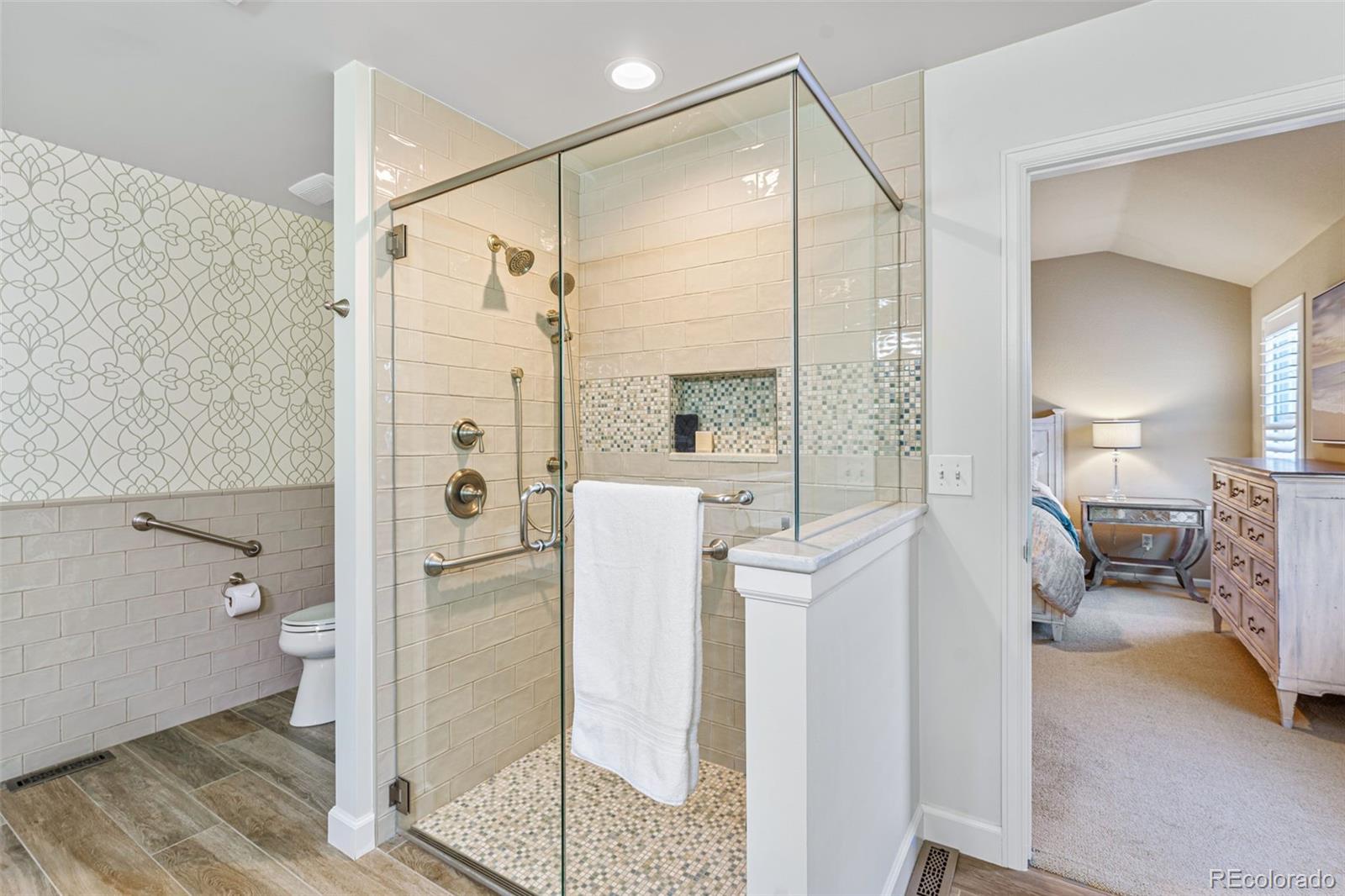 41 Quince Street Denver, CO 80230 - Photo 27 of 47 a en suite bathroom with a shower