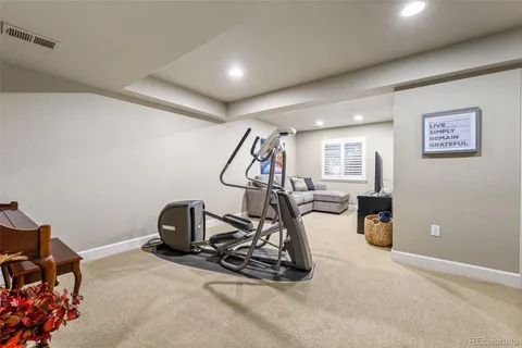 a view of a room with gym equipment