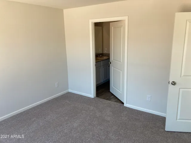 a bathroom with a tub and toilet