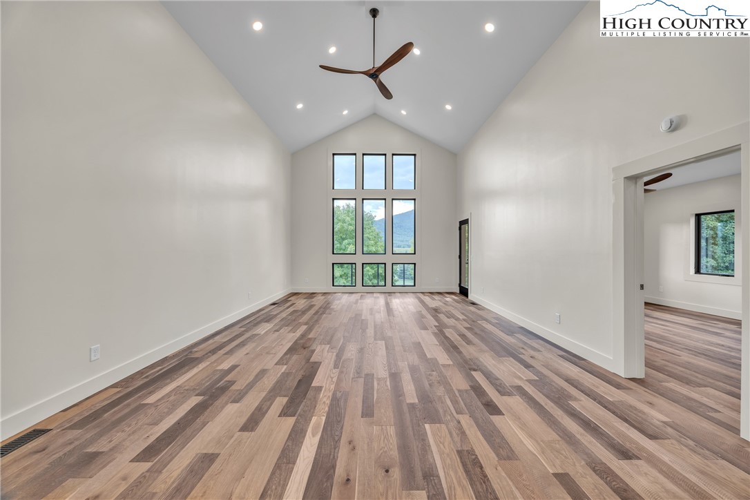 Range View Drive, Unit TBD Jefferson, NC 28640 - Photo 18 of 46 wooden floor in an empty room with a window