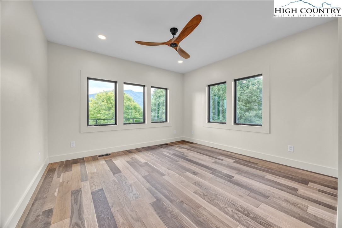 Range View Drive, Unit TBD Jefferson, NC 28640 - Photo 27 of 46 wooden floor in an empty room with a window