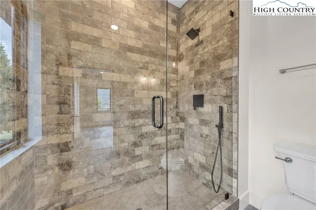 a view of outdoor space with wooden deck