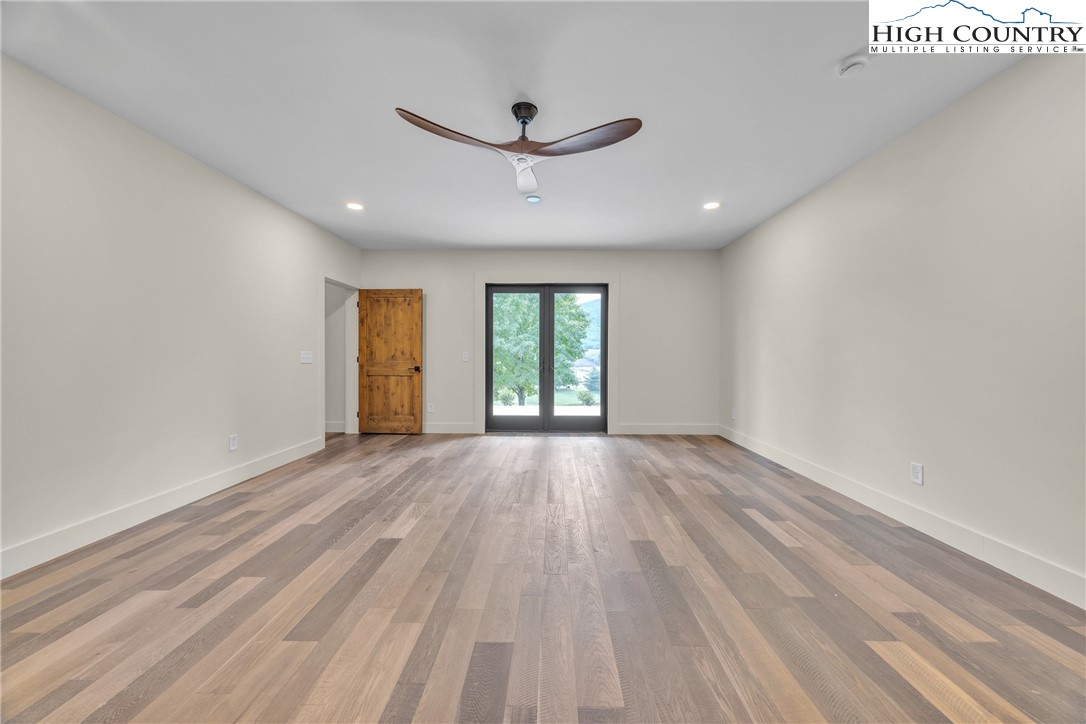 Range View Drive, Unit TBD Jefferson, NC 28640 - Photo 37 of 46 wooden floor in an empty room with a window
