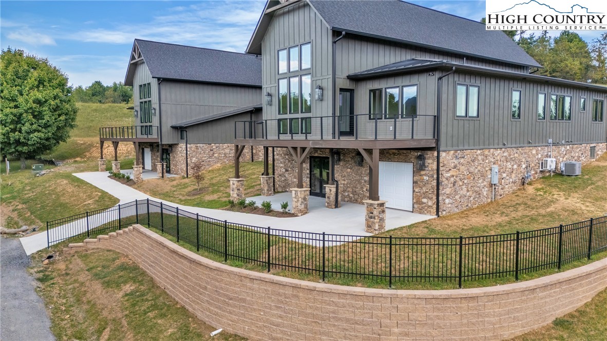 Range View Drive, Unit TBD Jefferson, NC 28640 - Photo 46 of 46 a view of a house with backyard and sitting area
