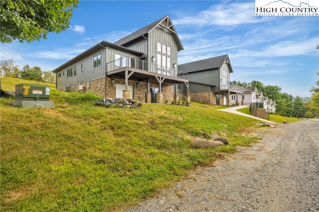 Range View Drive, Unit TBD Jefferson, NC 28640 - Photo 10 of 46 a front view of a house with a yard