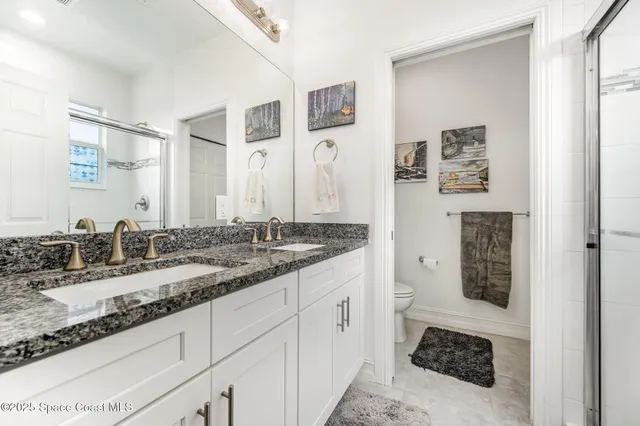 a bathroom with a tub and a sink