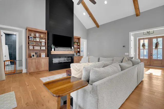 a kitchen with stainless steel appliances granite countertop a stove and a refrigerator