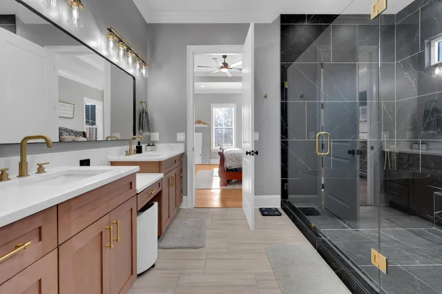 a bathroom with a sink and a mirror
