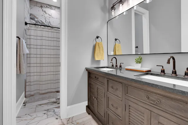 an aerial view of a house with a garden