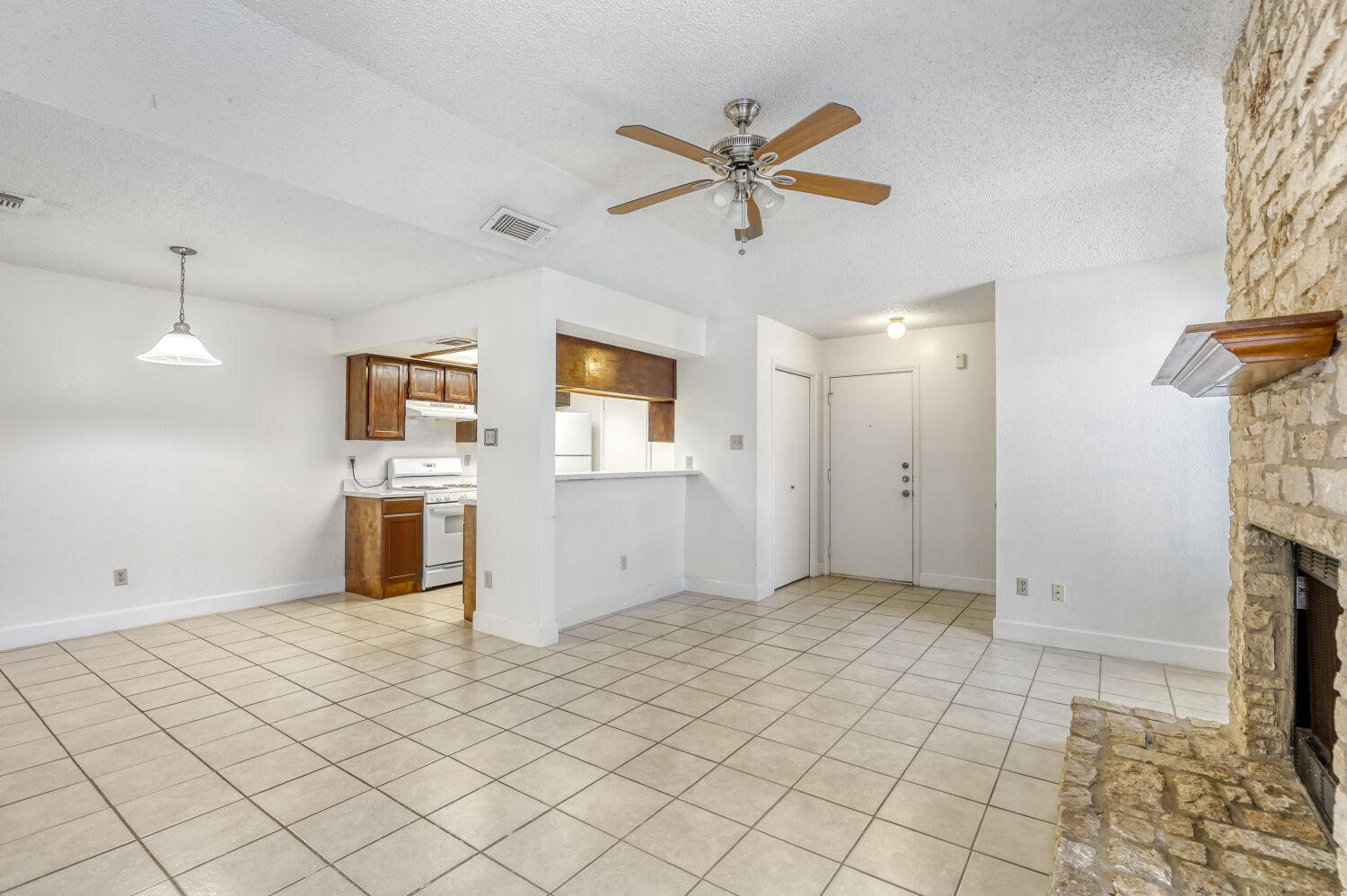 7806 Chimayo Cove, Unit B Austin, TX 78729 - Photo 4 of 11 a view of a kitchen with a sink