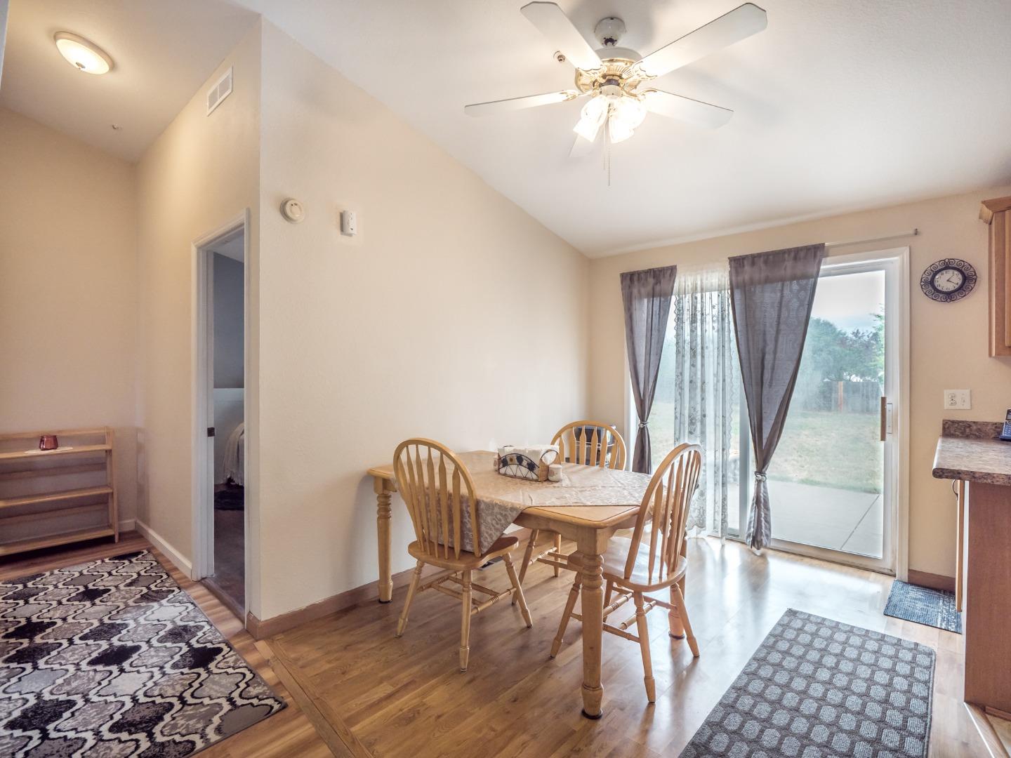 9 Dick Phelps Road Watsonville, CA 95076 - Photo 11 of 32 a view of a dining room with furniture and a chandelier