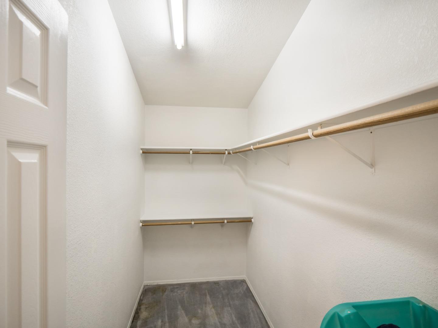 9 Dick Phelps Road Watsonville, CA 95076 - Photo 27 of 32 a view of walk in closet with empty racks