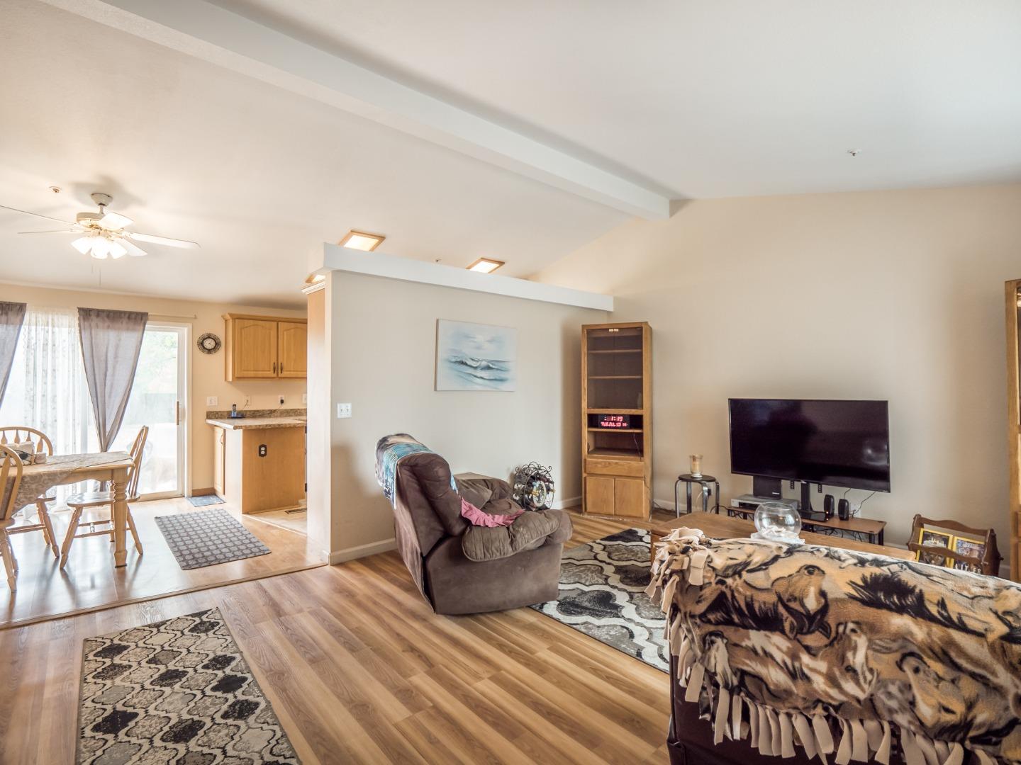 9 Dick Phelps Road Watsonville, CA 95076 - Photo 8 of 32 a living room with furniture and a flat screen tv