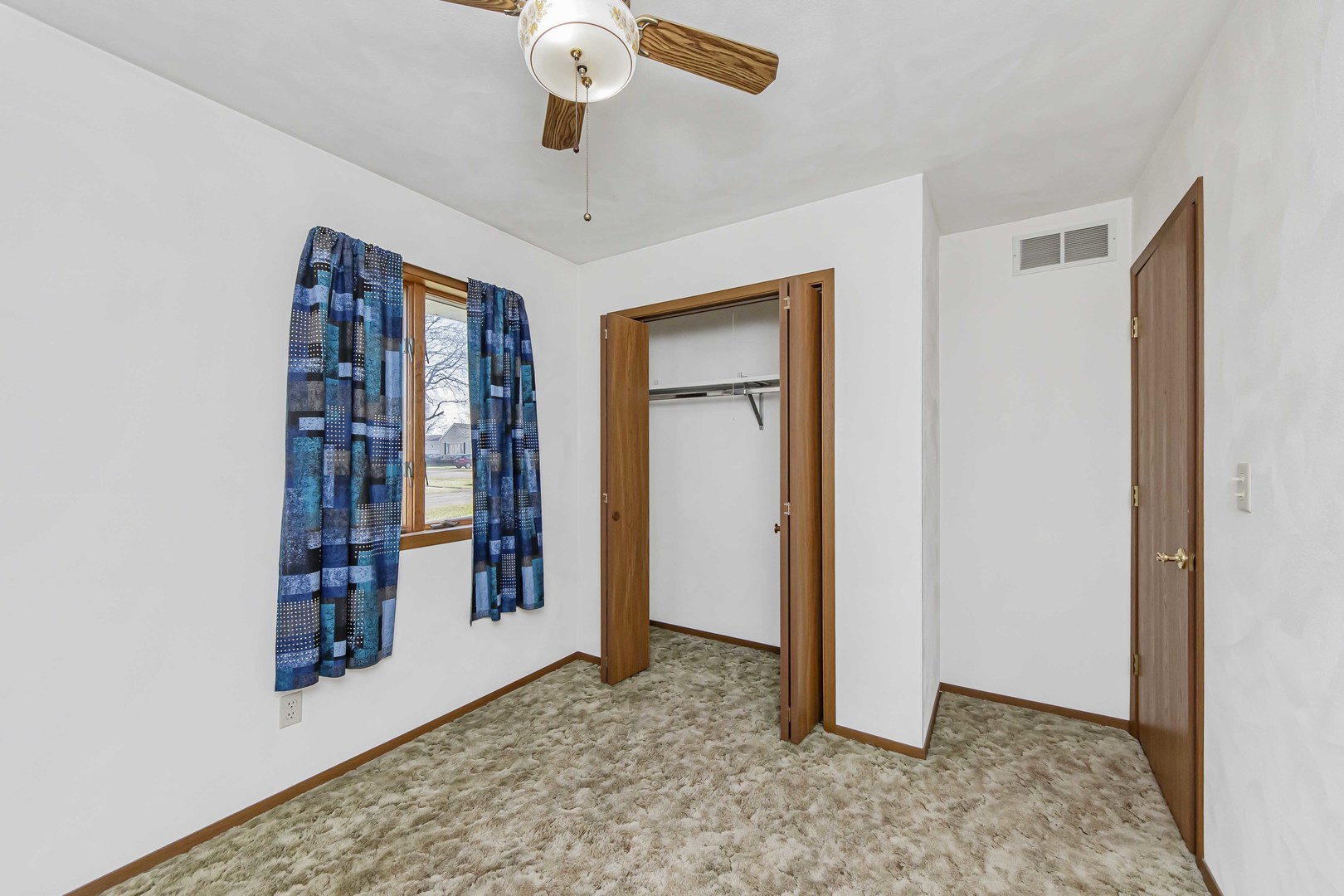313 West Topeka Street Toluca, IL 61369 - Photo 15 of 32 a view of an empty room with a window