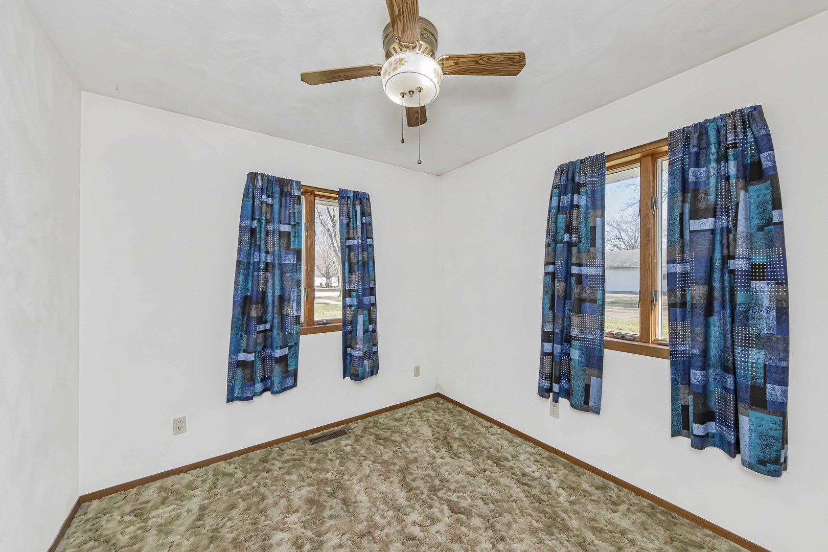313 West Topeka Street Toluca, IL 61369 - Photo 16 of 32 a view of an empty room with window and cabinet