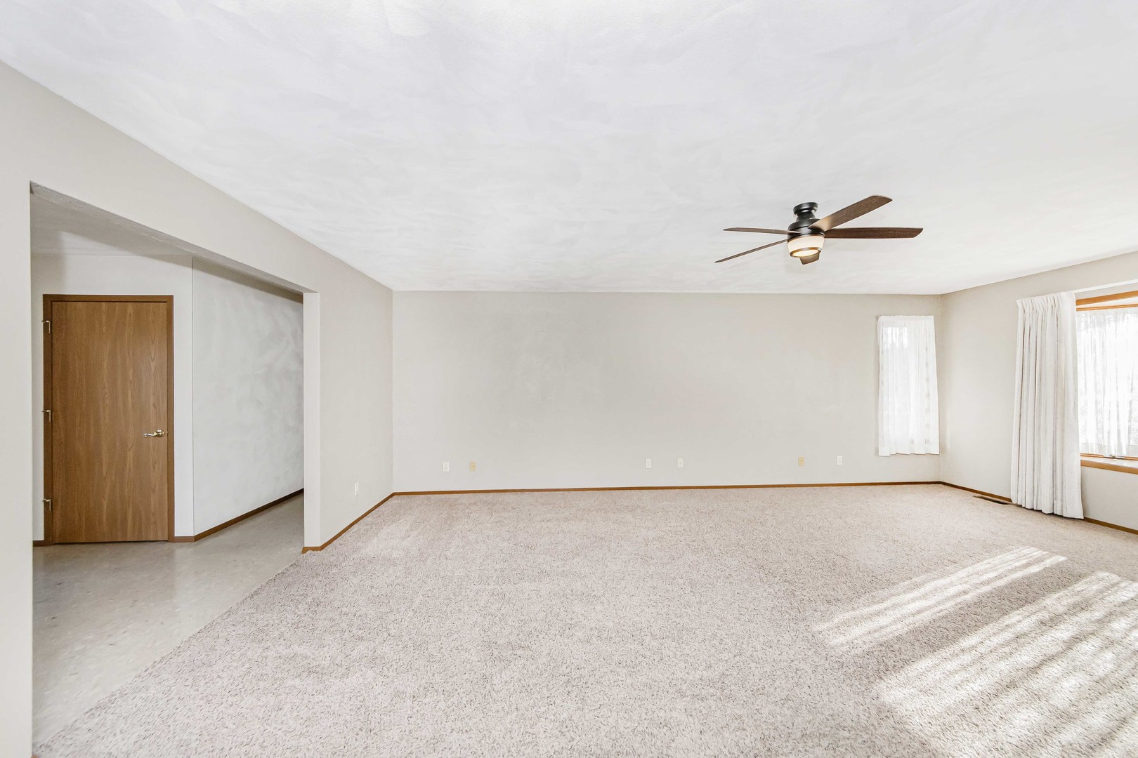 313 West Topeka Street Toluca, IL 61369 - Photo 9 of 32 a view of an empty room with a window