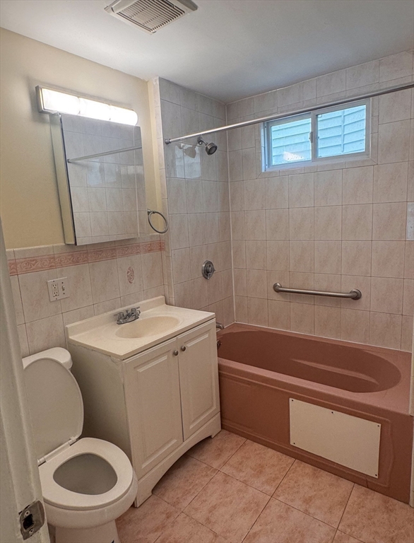 35 Hollander Street, Unit 2 Boston, MA 02121 - Photo 15 of 17 a bathroom with a sink a toilet and a bathtub