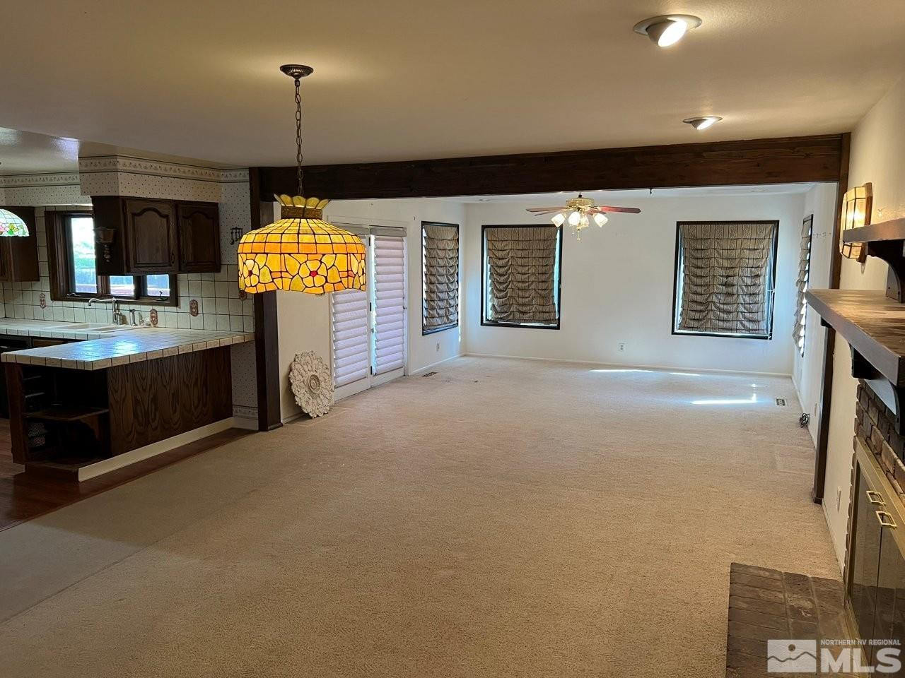 1840 Allen Street Reno, NV 89509 - Photo 2 of 20 a view of a kitchen with a sink and a fireplace
