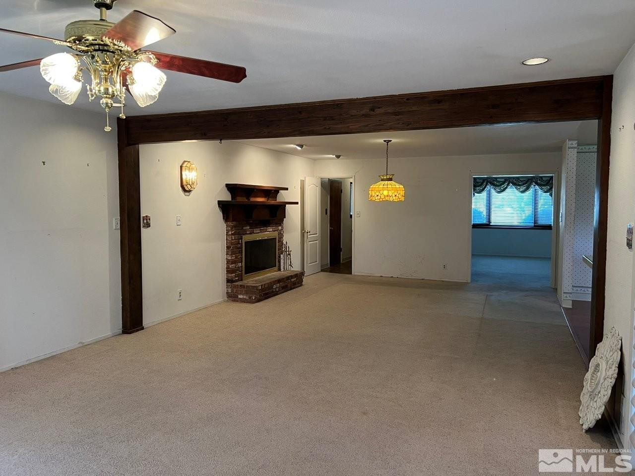 1840 Allen Street Reno, NV 89509 - Photo 3 of 20 a view of a livingroom with a flat screen tv