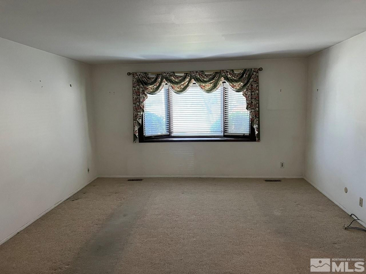 1840 Allen Street Reno, NV 89509 - Photo 7 of 20 an empty room with a window