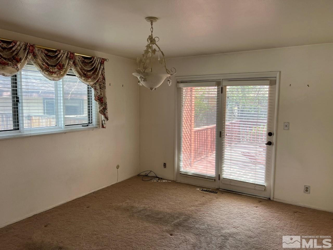 1840 Allen Street Reno, NV 89509 - Photo 8 of 20 an empty room with a window