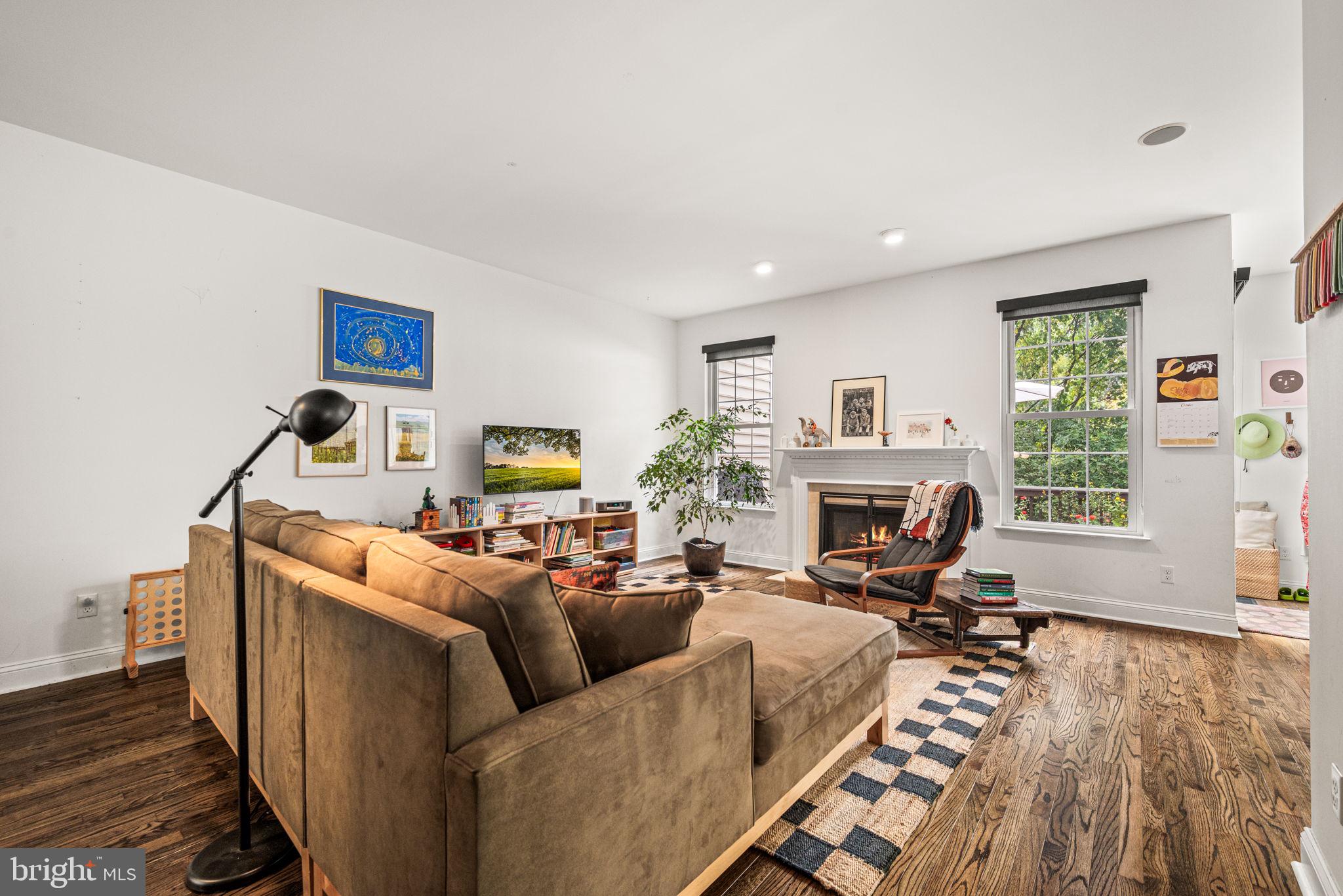 102 Dundee Mills Lane Wallingford, PA 19086 - Photo 10 of 43 a living room with furniture and a fireplace