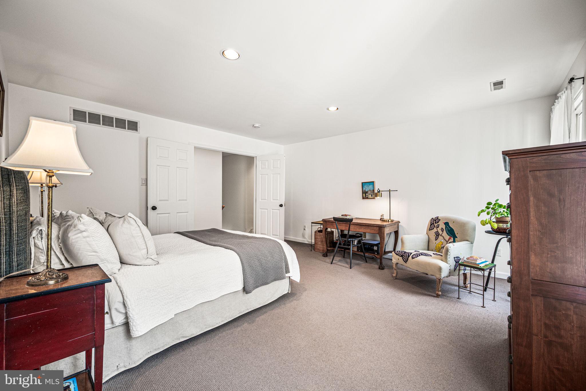 102 Dundee Mills Lane Wallingford, PA 19086 - Photo 23 of 43 a bedroom with bed and a couch