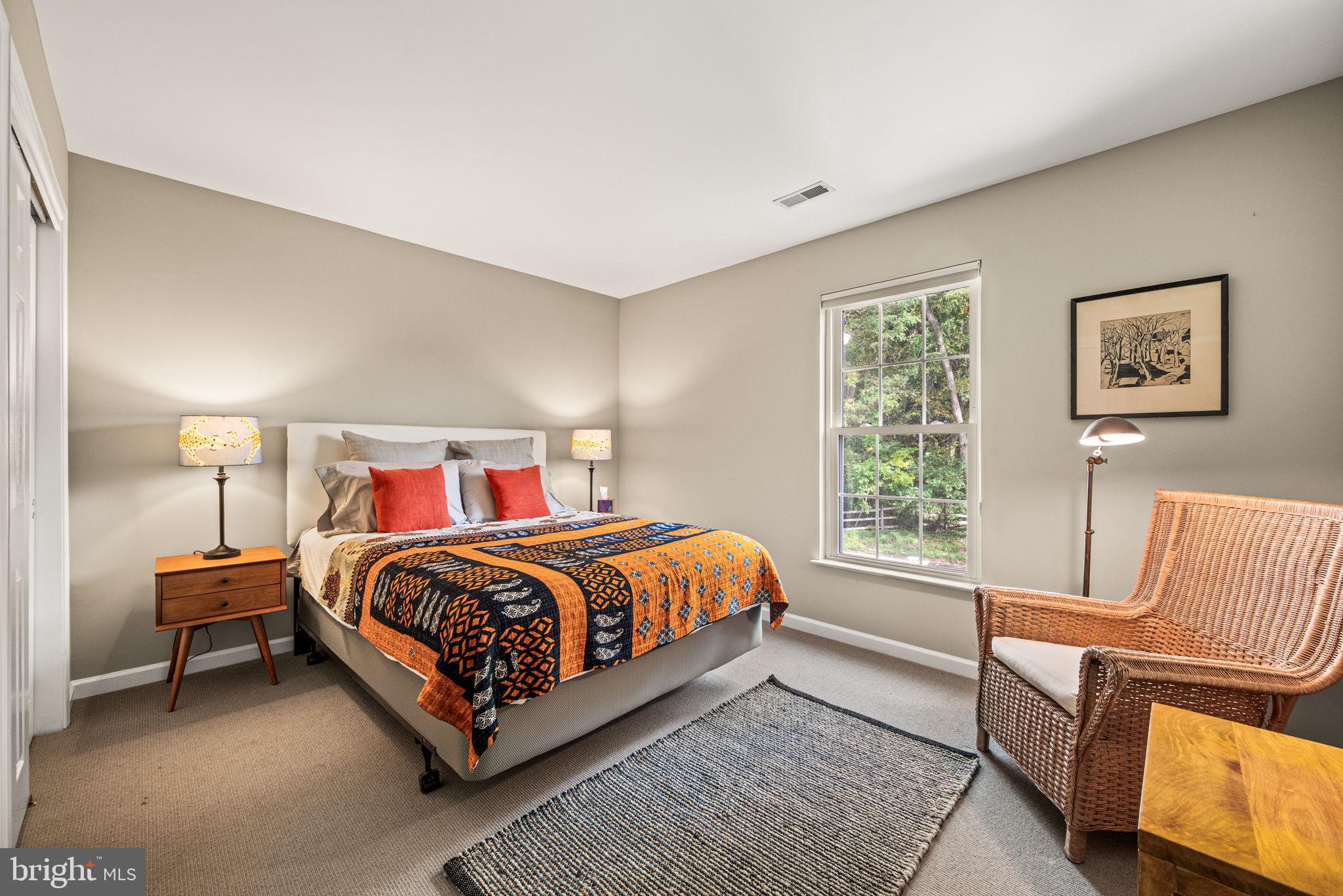 102 Dundee Mills Lane Wallingford, PA 19086 - Photo 29 of 43 a bedroom with a bed and window