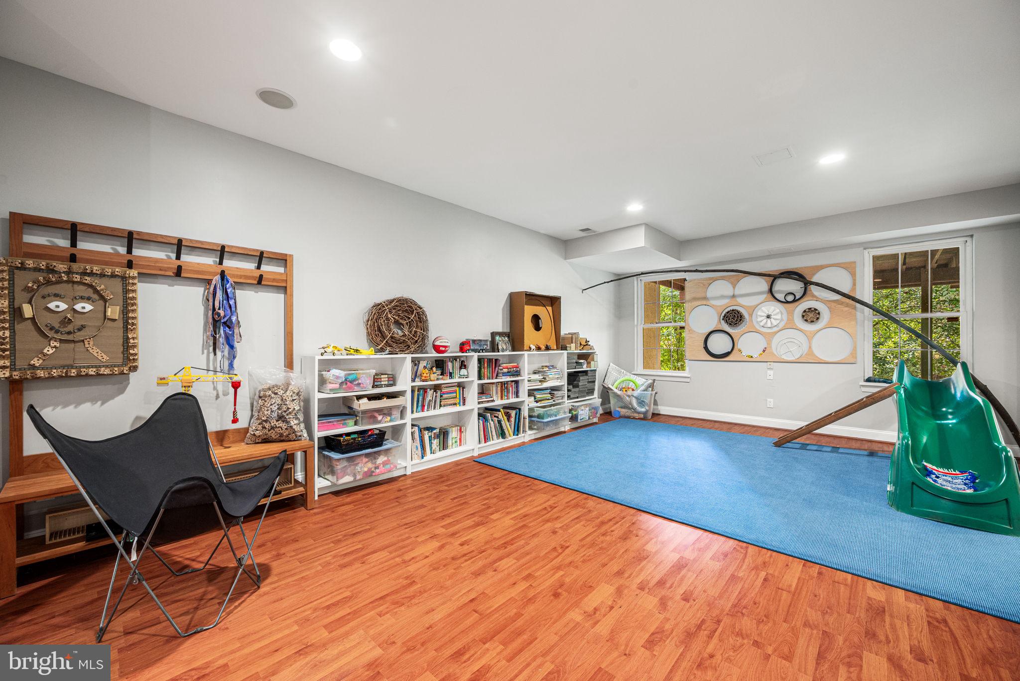 102 Dundee Mills Lane Wallingford, PA 19086 - Photo 34 of 43 a room with furniture and wooden floor