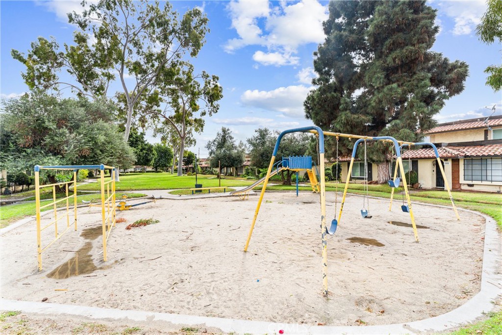 3927 West McFadden Avenue, Unit B Santa Ana, CA 92704 - Photo 14 of 14 a view of a swimming pool with an outdoor space