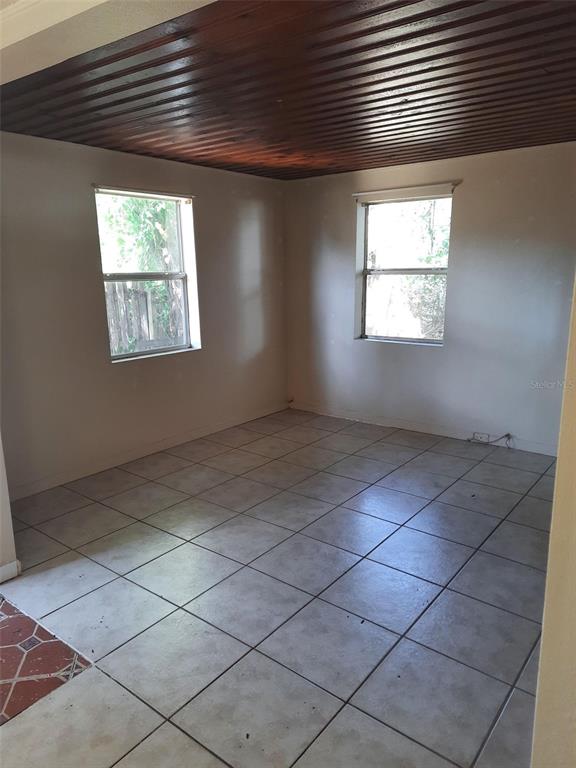2553 52nd Avenue North St. Petersburg, FL 33714 - Photo 3 of 6 an empty room with windows