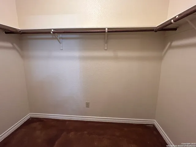 a view of a room with racks on the wall