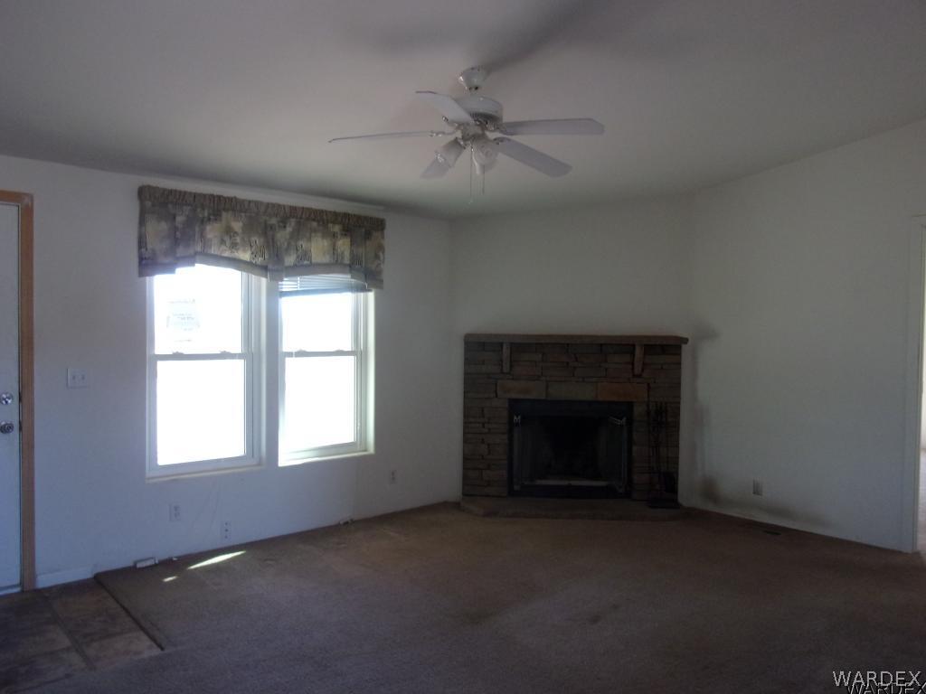 4229 Drake Road Golden Valley, AZ 86413 - Photo 11 of 19 Corner fireplace