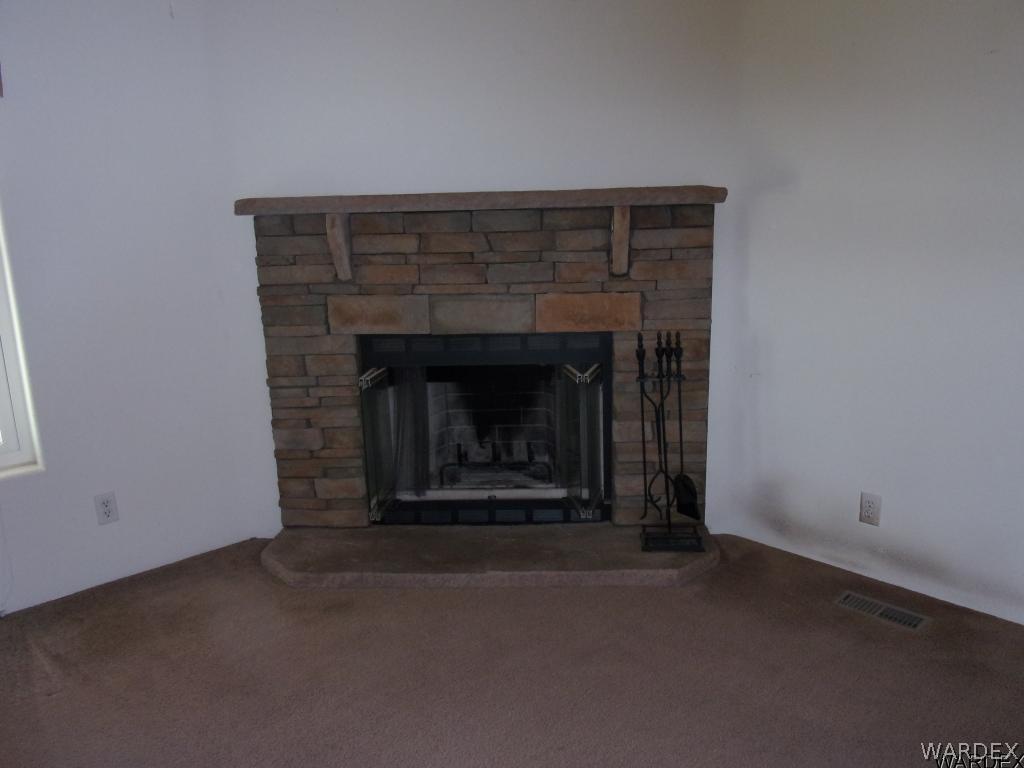 4229 Drake Road Golden Valley, AZ 86413 - Photo 13 of 19 Woodburning fireplace