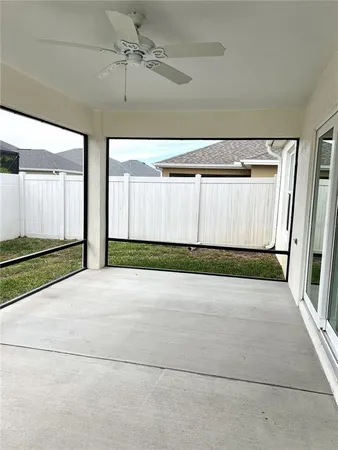 a view of porch with wooden floor
