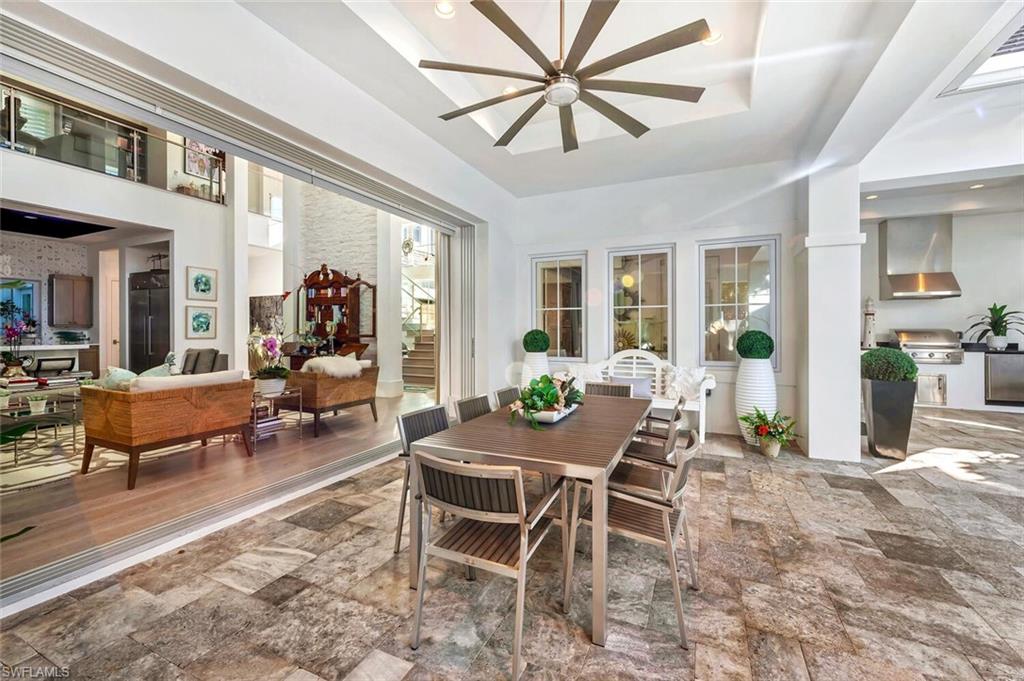 9193 Mercato Way Naples, FL 34108 - Photo 23 of 36 OUTDOOR DINING AREA