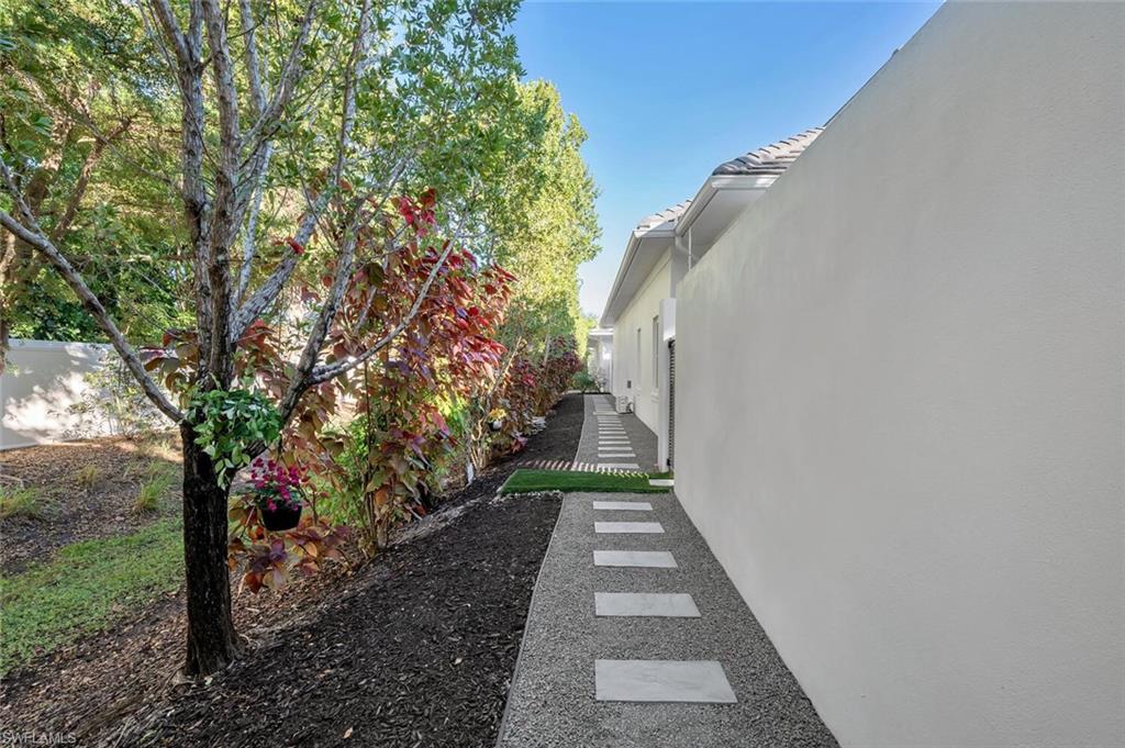 9193 Mercato Way Naples, FL 34108 - Photo 33 of 36 PET WALK AREA BEHIND HOME