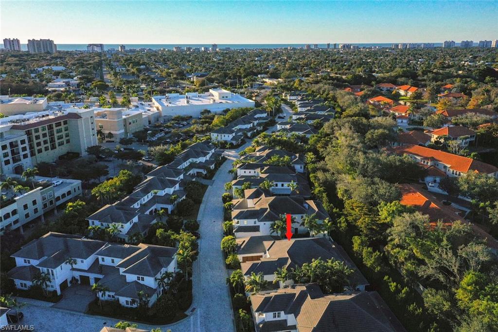 9193 Mercato Way Naples, FL 34108 - Photo 34 of 36 an aerial view of residential houses with outdoor space