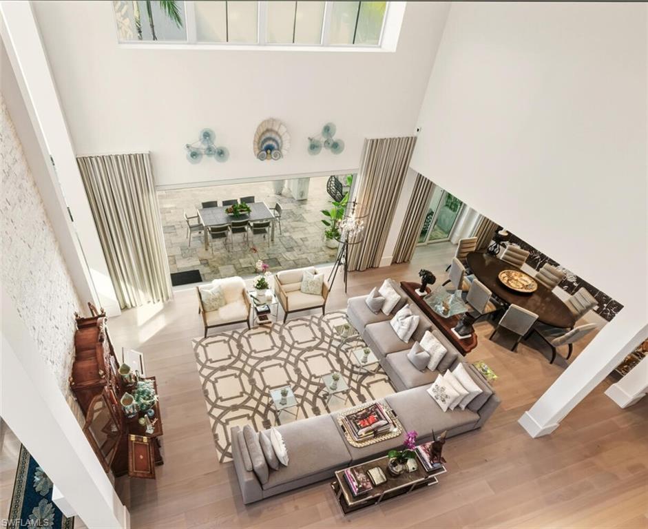 9193 Mercato Way Naples, FL 34108 - Photo 4 of 36 LOOKING DOWN FROM THE LOFT