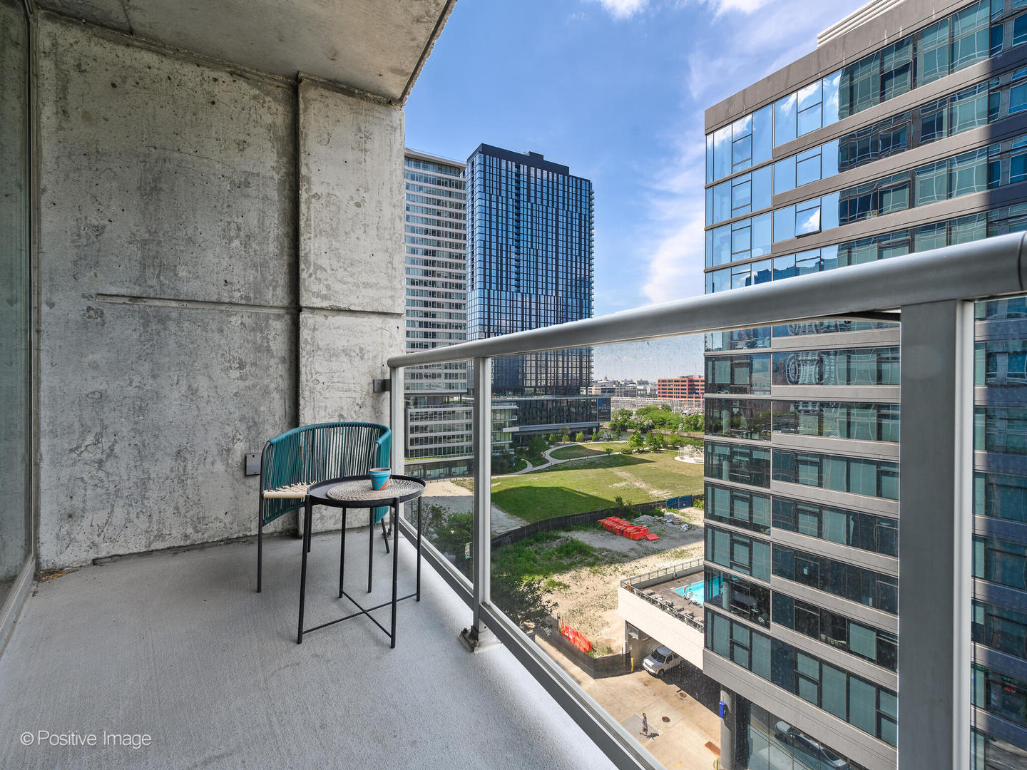 611 South Wells Street, Unit 906 Chicago, IL 60607 - Photo 3 of 21 a view of roof deck with chair and tables