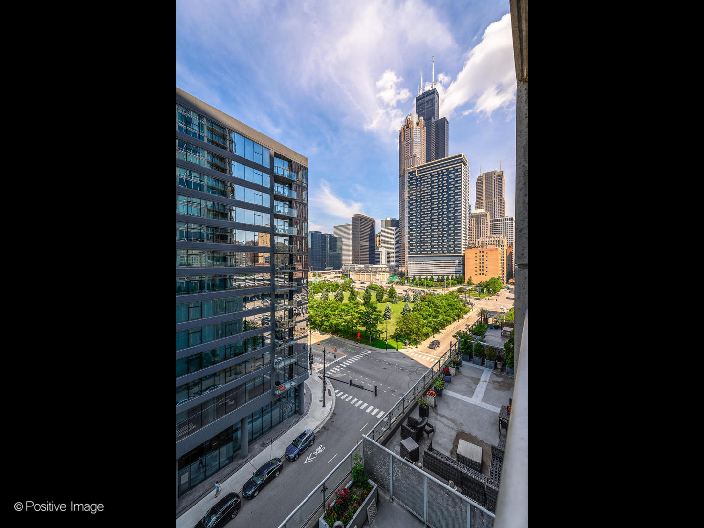 611 South Wells Street, Unit 906 Chicago, IL 60607 - Photo 4 of 21 a view of a balcony with an outdoor space