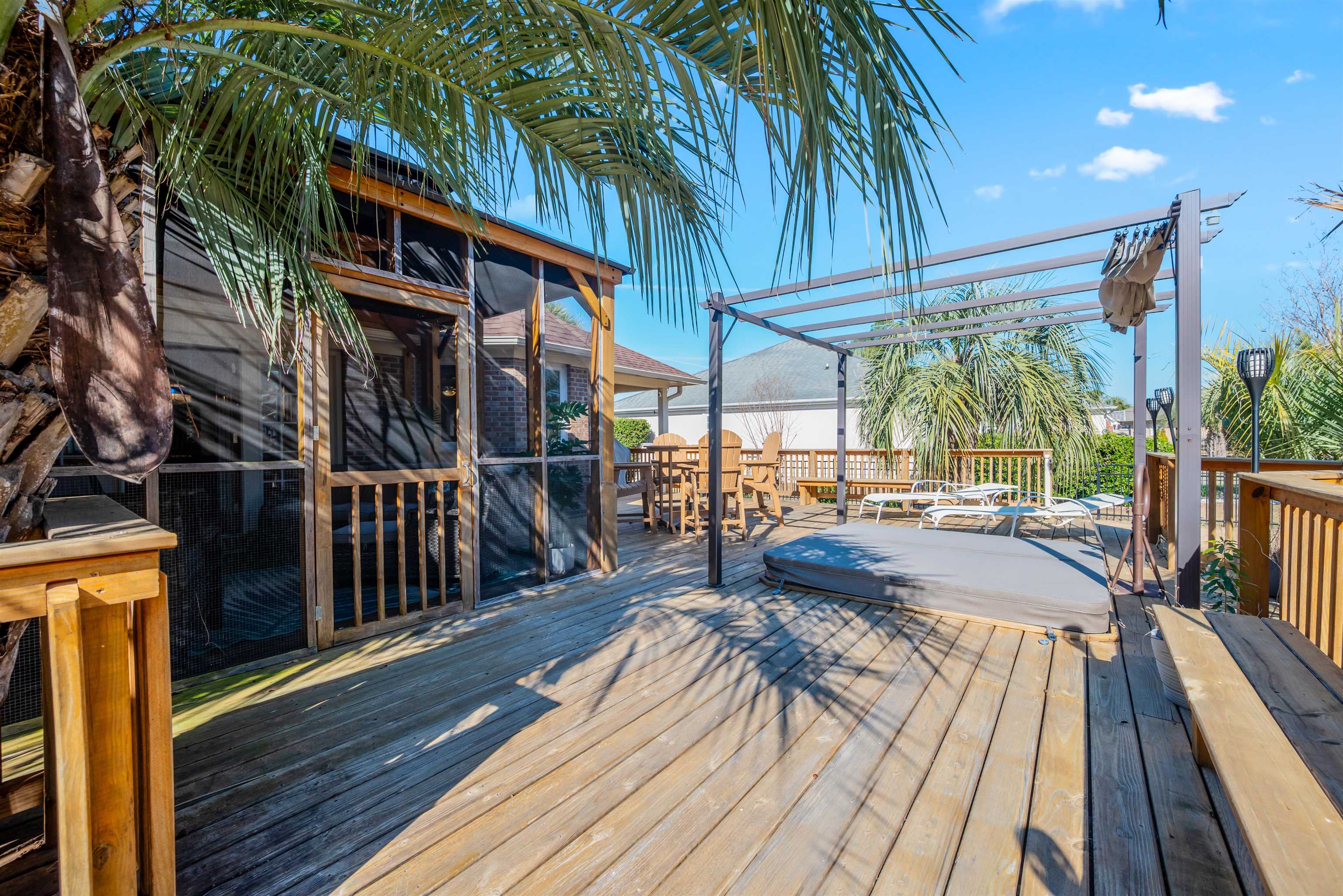 4746 National Drive Myrtle Beach, SC 29579 - Photo 36 of 40 Deck featuring outdoor dining space and a sunroom