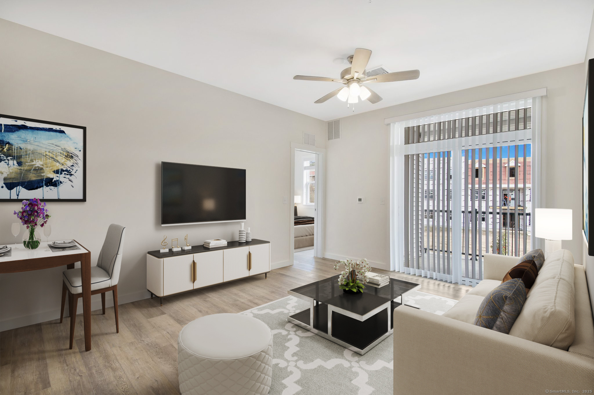 280 Salmon Brook Street, Unit 6202A Granby, CT 06035 - Photo 16 of 34 a living room with furniture and a flat screen tv