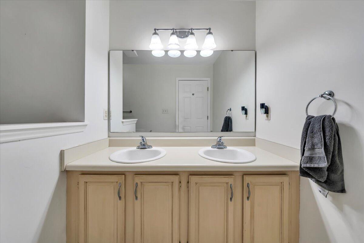 7851 Cedar Edge Road Roanoke, VA 24018 - Photo 23 of 44 a bathroom with a sink and a mirror