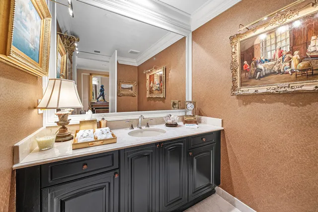 a view of a swimming pool and an chairs