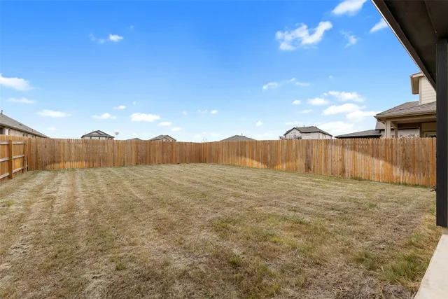 a view of an outdoor space and a yard